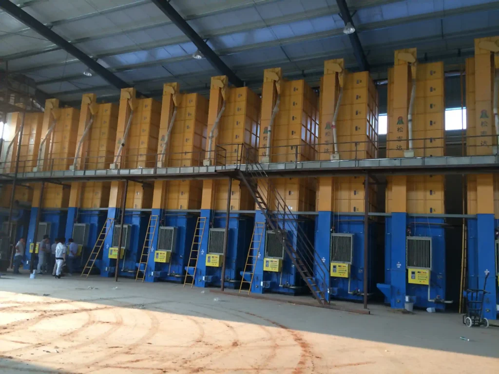 Large-scale agricultural grain processing with Presun 5HPX-30C batch dryers in industrial warehouse